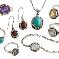 a realistic image of multiple sterling silver jewelry with natural gemstones on a white background